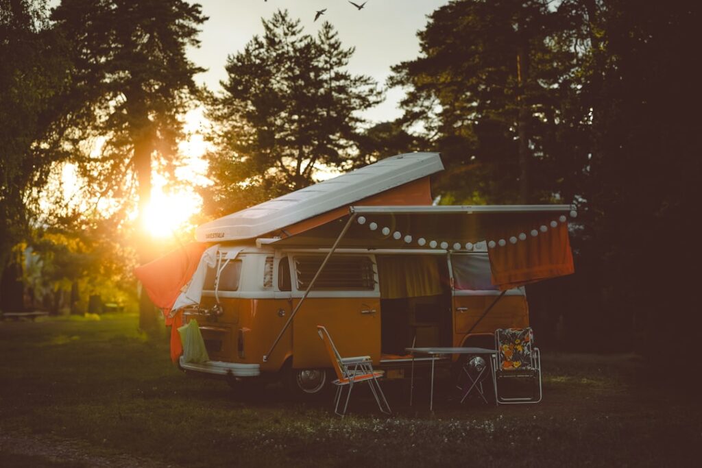 Camper van parked off grid at sunset